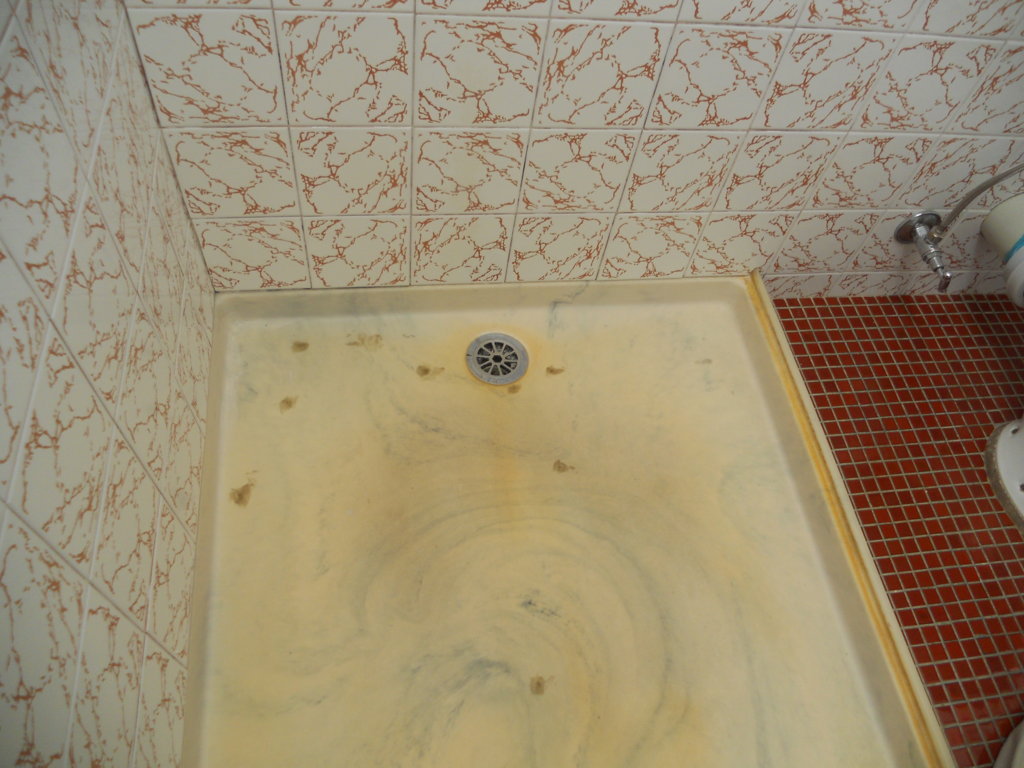 Dirty shower floor before